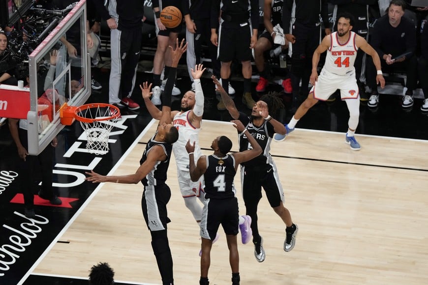 Jun 3, 2026; San Antonio, Texas, USA; New York Knicks guard Jalen Brunson (11) shoots the ball past San Antonio Spurs forward Victor Wembanyama (1) in the second half during game one of the 2026 NBA Finals at Frost Bank Center. Mandatory Credit: Scott Wachter-Imagn Images