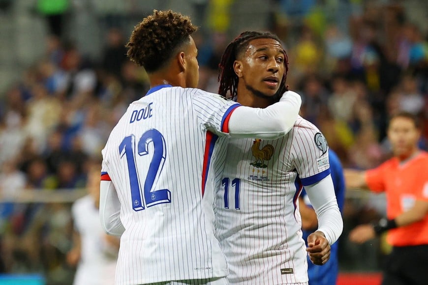 Soccer Football - World Cup - UEFA Qualifiers - Group D - Ukraine v France - Wroclaw Stadium, Wroclaw, Poland - September 5, 2025
France's Michael Olise celebrates scoring their first goal with Desire Doue REUTERS/Kacper Pempel