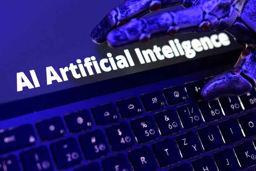 Words "AI Artificial Inteligence", keyboard, and a robotic hand in this illustration taken June 5, 2026. REUTERS/Dado Ruvic/Illustration