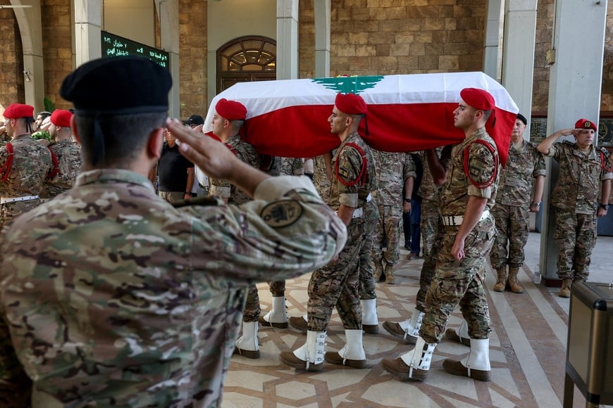 Members of the Lebanese military carry a coffin during the funeral of Brigadier General Wissam Sabra, who was killed in an Israeli strike targeting their military vehicle on the Khardali-Nabatieh road in south Lebanon on Saturday, in Beirut, Lebanon June 7, 2026. REUTERS/Mohamed Azakir TPX IMAGES OF THE DAY