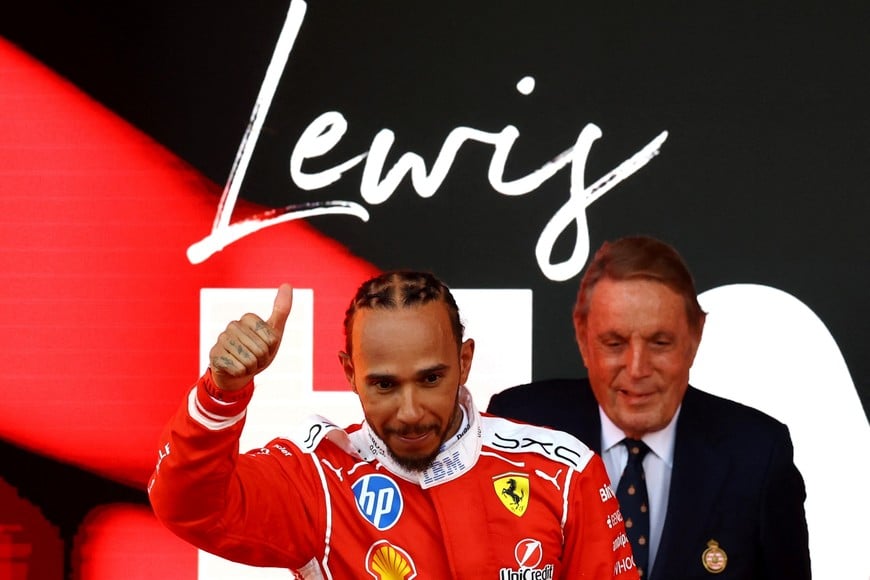 Formula One F1 - Monaco Grand Prix - Circuit de Monaco, Monaco - June 7, 2026
Ferrari's Lewis Hamilton celebrates on the podium after finishing second in the Monaco Grand Prix REUTERS/Yves Herman