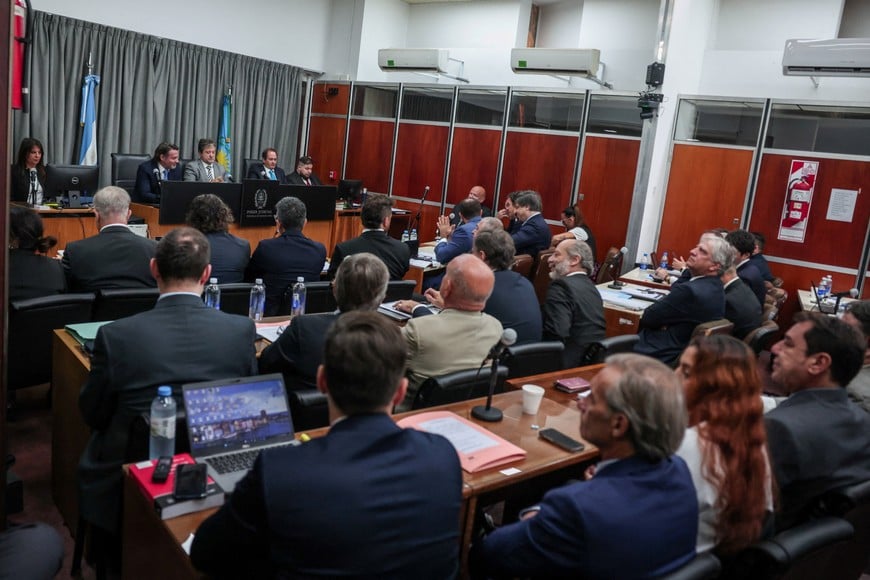 People sit inside a court to attend a new trial against medical professionals facing accusations of negligence in connection to the 2020 death of late Argentine soccer legend Diego Armando Maradona, in Buenos Aires, Argentina, April 14, 2026. REUTERS/Cristina Sille