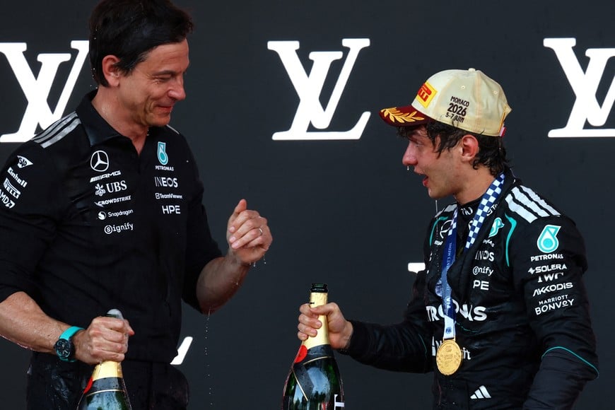 Formula One F1 - Monaco Grand Prix - Circuit de Monaco, Monaco - June 7, 2026
Mercedes' Andrea Kimi Antonelli celebrates on the podium with Mercedes team principal Toto Wolff after winning the Monaco Grand Prix REUTERS/Yves Herman