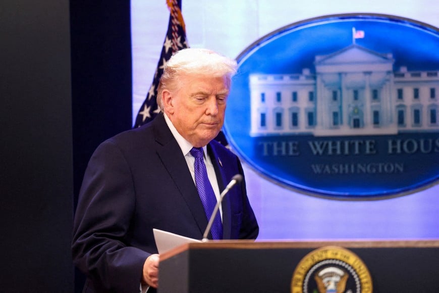 FILE PHOTO: U.S. President Donald Trump arrives for a press briefing at the White House, following the Supreme Court's ruling that Trump had exceeded his authority when he imposed tariffs, in Washington, D.C., U.S., February 20, 2026. REUTERS/Kevin Lamarque/File Photo