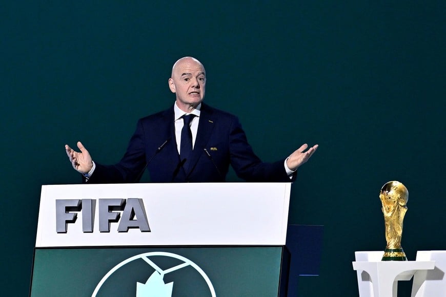 Soccer Football - 76th FIFA Congress - Vancouver Convention Centre, Vancouver, Canada - April 30, 2026
FIFA President Gianni Infantino speaks during the congress as the FIFA World Cup Trophy is seen REUTERS/Jennifer Gauthier