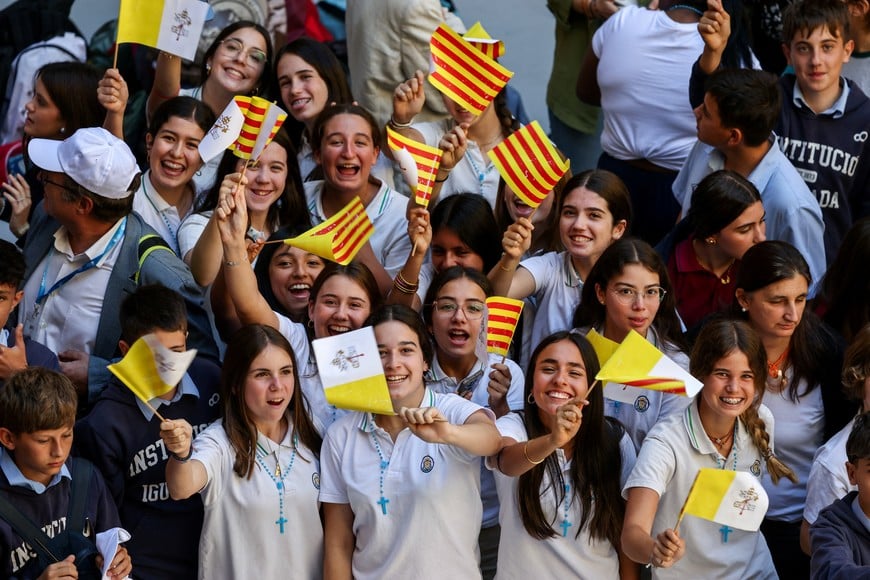 People wave Vatican and Catalan flags as they wait for the arrival of Pope Leo XIV at the Abbey of Our Lady of Montserrat, during his apostolic journey, in Montserrat, near Barcelona, Spain, June 10, 2026. REUTERS/Yara Nardi