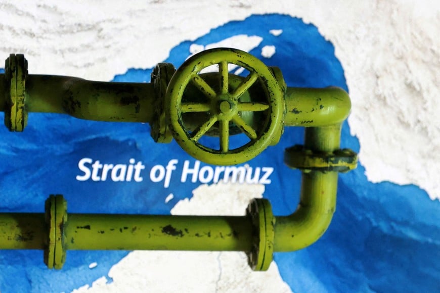 FILE PHOTO: A map showing the Strait of Hormuz and a 3D printed oil pipeline are seen in this illustration taken March 23, 2026. REUTERS/Dado Ruvic/Illustration/File Photo