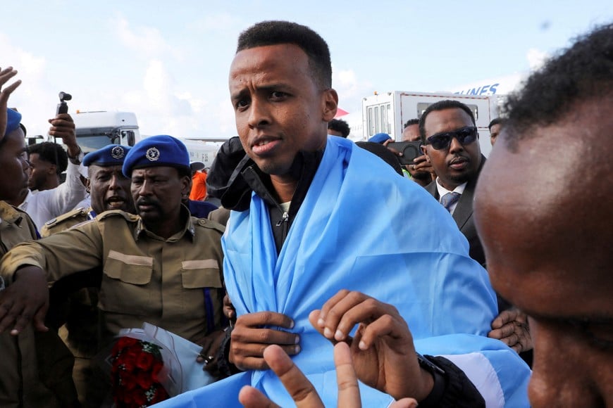 Somali referee Omar Abdulkadir Artan, who had been expected to officiate at matches during the 2026 FIFA World Cup but was denied entry to the United States, is received as he arrives at the Aden Abdulle Osman International Airport in Mogadishu, Somalia June 10, 2026. REUTERS/Feisal Omar TPX IMAGES OF THE DAY