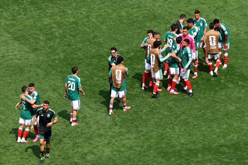 Soccer Football - FIFA World Cup 2026 - Group A - Mexico v South Africa - Estadio Azteca, Mexico City, Mexico - June 11, 2026
Mexico's Mateo Chavez and Erik Lira celebrate with teammates after the match REUTERS/Raquel Cunha