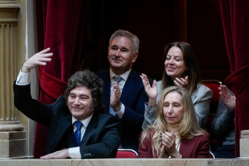 Argentina's President Javier Milei gestures, next to General Secretary of the Presidency Karina Milei, on the day Argentina's Cabinet Chief Manuel Adorni presents his management report at the National Congress, in Buenos Aires, Argentina, April 29, 2026. REUTERS/Mariana Nedelcu