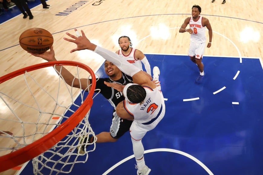 Jun 10, 2026; New York, New York, USA; San Antonio Spurs forward Keldon Johnson (3) shoots the ball against New York Knicks guard Josh Hart (3) during the third quarter in Game Four of the 2026 NBA Finals at Madison Square Garden on June 10, 2026 in New York City. Mandatory Credit: Al Bello-Pool Photo via Imagn Images