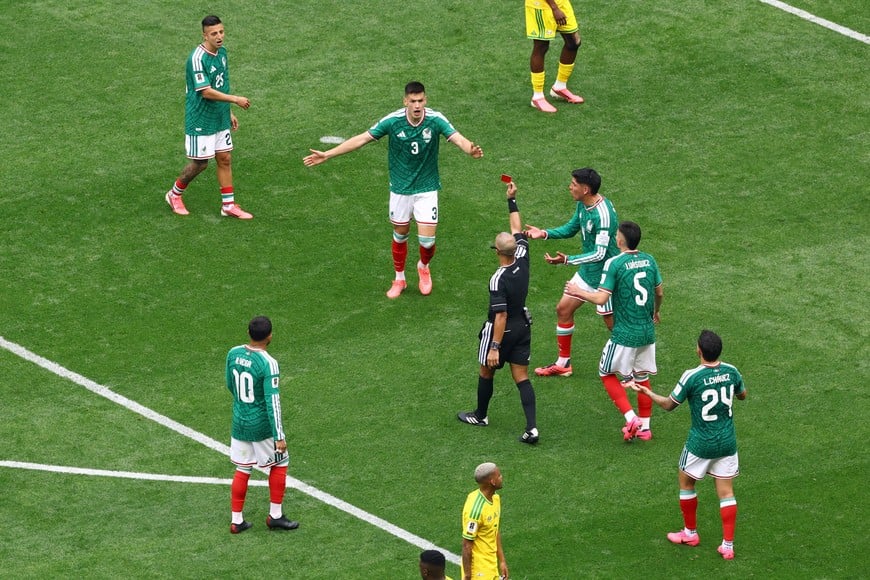 Soccer Football - FIFA World Cup 2026 - Group A - Mexico v South Africa - Estadio Azteca, Mexico City, Mexico - June 11, 2026
Mexico's Cesar Montes reacts after being shown a red card by referee Wilton Pereira Sampaio REUTERS/Raquel Cunha