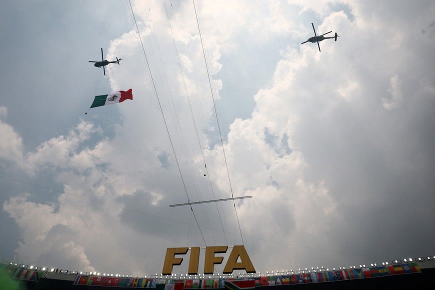 Soccer Football - FIFA World Cup 2026 - Group A - Mexico v South Africa - Estadio Azteca, Mexico City, Mexico - June 11, 2026
General view as helicoptors fly over the stadium before the match REUTERS/Kai Pfaffenbach