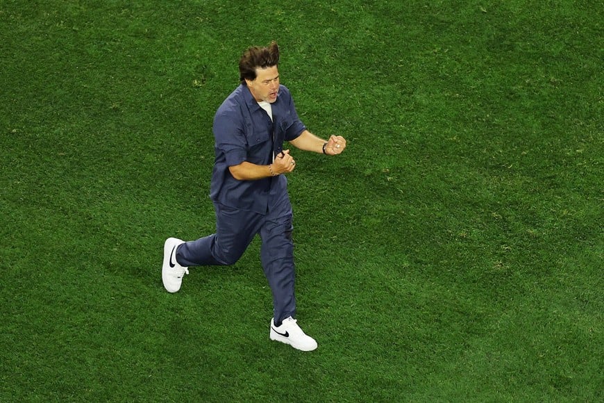Soccer Football - FIFA World Cup 2026 - Group D - United States v Paraguay - Los Angeles Stadium, Inglewood, California, U.S. - June 12, 2026
U.S. coach Mauricio Pochettino celebrates after Giovanni Reyna scored their fourth goal REUTERS/Daniel Cole TPX IMAGES OF THE DAY