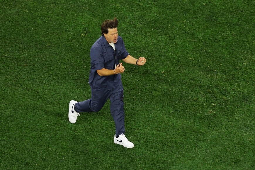Soccer Football - FIFA World Cup 2026 - Group D - United States v Paraguay - Los Angeles Stadium, Inglewood, California, U.S. - June 12, 2026
U.S. coach Mauricio Pochettino celebrates after Giovanni Reyna scored their fourth goal REUTERS/Daniel Cole