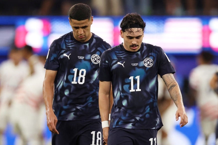 Soccer Football - FIFA World Cup 2026 - Group D - United States v Paraguay - Los Angeles Stadium, Inglewood, California, U.S. - June 12, 2026
Paraguay's Alex Arce and Mauricio look dejected after Giovanni Reyna of the U.S. scores their fourth goal IMAGN IMAGES via Reuters/Kiyoshi Mio
