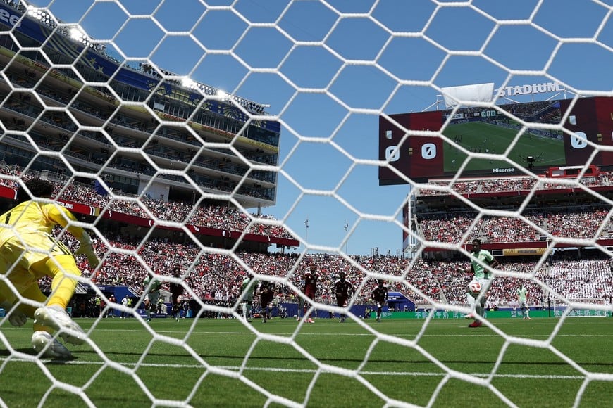Soccer Football - FIFA World Cup 2026 - Group B - Qatar v Switzerland - San Francisco Bay Area Stadium, Santa Clara, California, U.S. - June 13, 2026
Switzerland's Breel Embolo scores their first goal from the penalty spot past Qatar's Mahmoud Abunada REUTERS/Carlos Barria