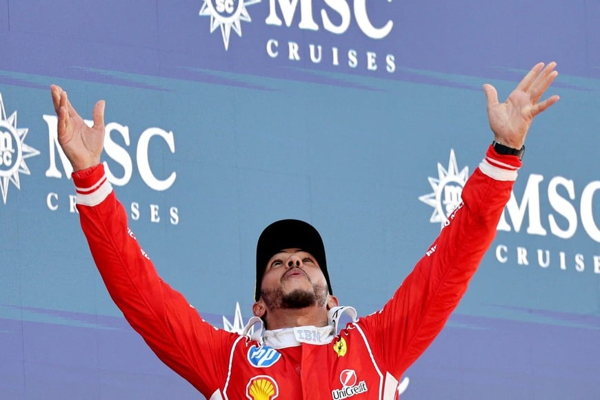 Formula One F1 - Barcelona-Catalunya Grand Prix - Circuit de Barcelona-Catalunya, Barcelona, Spain - June 14, 2026
Ferrari's Lewis Hamilton celebrates with a trophy after winning the Barcelona-Catalunya Grand Prix REUTERS/Nacho Doce TPX IMAGES OF THE DAY