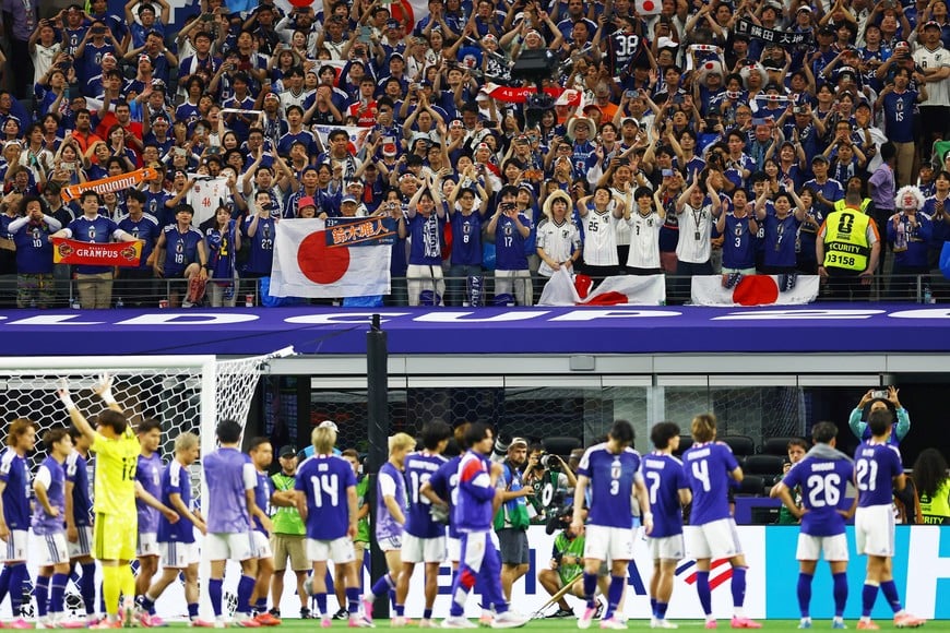 Soccer Football - FIFA World Cup 2026 - Group F - Netherlands v Japan - Dallas Stadium, Arlington, Texas, U.S. - June 14, 2026 Japan fans applaud their players after the match REUTERS/Issei Kato