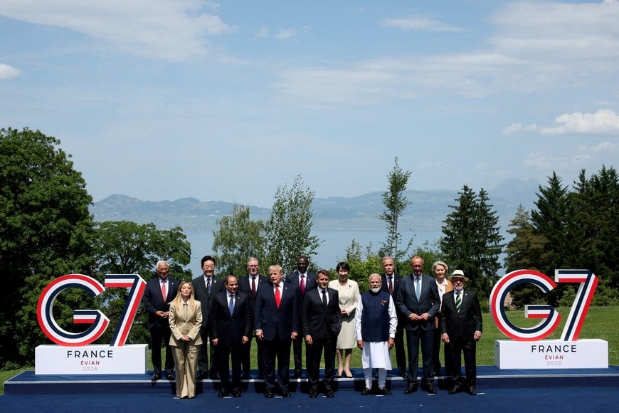 U.S. President Donald Trump, French President Emmanuel Macron, Canadian Prime Minister Mark Carney, Italian Prime Minister Giorgia Meloni, Japanese Prime Minister Sanae Takaichi, European Commission President Ursula von der Leyen, European Council President Antonio Costa, German Chancellor Friedrich Merz, Egyptian President Abdel Fattah al-Sisi, South Korea's President Lee Jae Myung, India's Prime Minister Narendra Modi, Brazilian President Luiz Inacio Lula da Silva, Kenya's President William Ruto and British Prime Minister Keir Starmer pose for a family photo during the G7 summit, in Evian-les-Bains, France, June 16, 2026. REUTERS/Isabel Infantes/Pool      REFILE - FIXING HEADLINE     TPX IMAGES OF THE DAY
