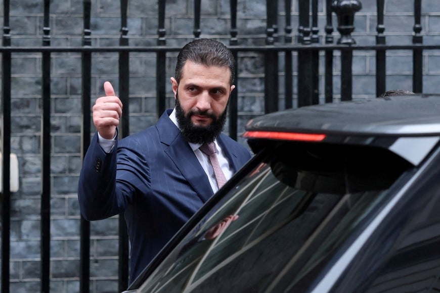Syrian President Ahmed al-Sharaa gestures outside 10 Downing Street, after meeting with Britain's Prime Minister Keir Starmer, in London, Britain March 31, 2026. REUTERS/Hannah McKay TPX IMAGES OF THE DAY