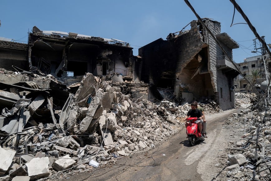 Men ride a motorcycle past shops and buildings damaged by Israeli strikes in Nabatieh, Lebanon, June 17, 2026. REUTERS/Zohra Bensemra
TPX IMAGES OF THE DAY
