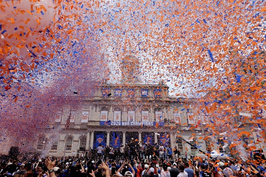 Jun 18, 2026; New York, NY, USA; New York Knicks players and coaches and staff celebrate their NBA championship with New York dignitaries and fans following a ceremony at New York City Hall. Mandatory Credit: Brad Penner-Imagn Images     TPX IMAGES OF THE DAY