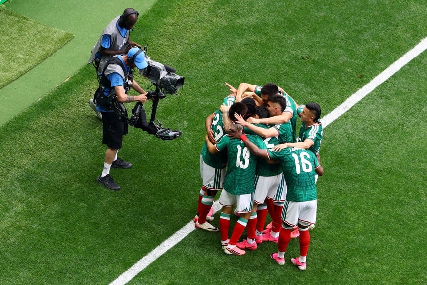 Soccer Football - FIFA World Cup 2026 - Group A - Mexico v South Africa - Estadio Azteca, Mexico City, Mexico - June 11, 2026
Mexico's Raul Jimenez celebrates scoring their second goal with teammates REUTERS/Raquel Cunha