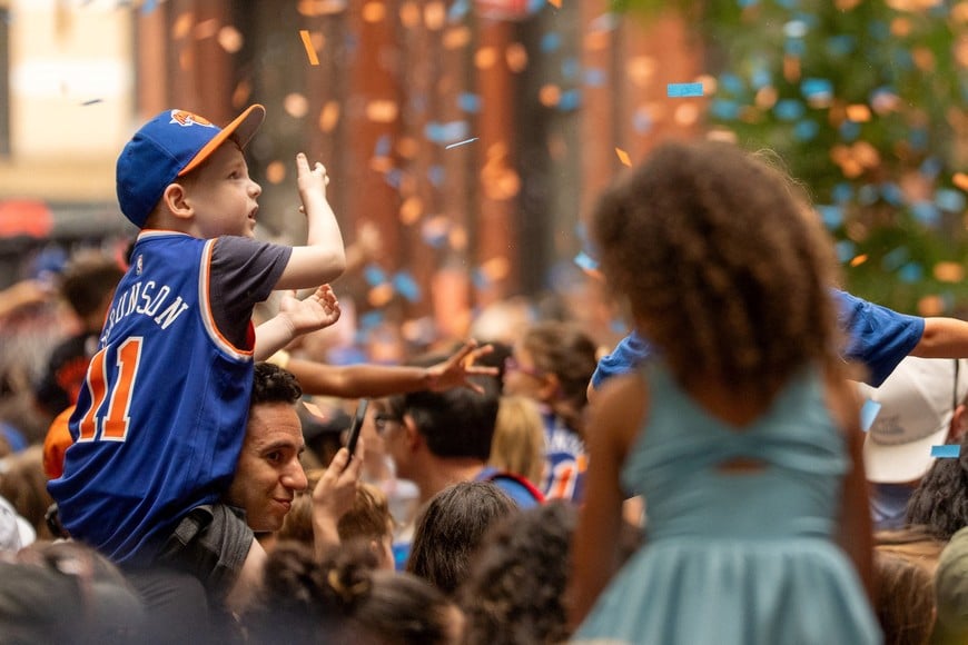 Guardians and children gather to celebrate the championship win by the NY Knicks at the Children's Museum of Manhattan in New York City, U.S., June 17, 2026. REUTERS/David Dee Delgado
