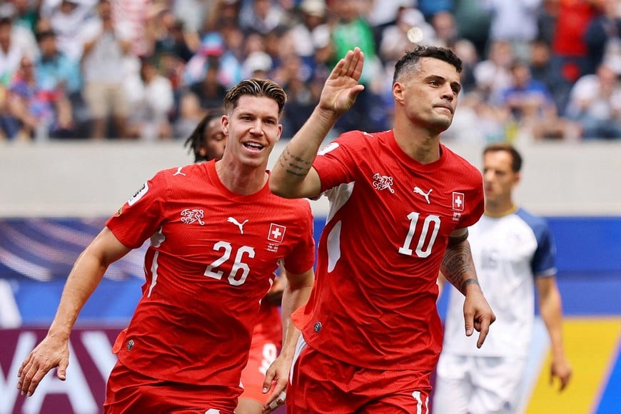 Soccer Football - FIFA World Cup 2026 - Group B - Switzerland v Bosnia and Herzegovina - Los Angeles Stadium, Inglewood, California, U.S. - June 18, 2026
Switzerland's Granit Xhaka celebrates scoring their fourth goal with Cedric Itten REUTERS/Daniel Cole TPX IMAGES OF THE DAY