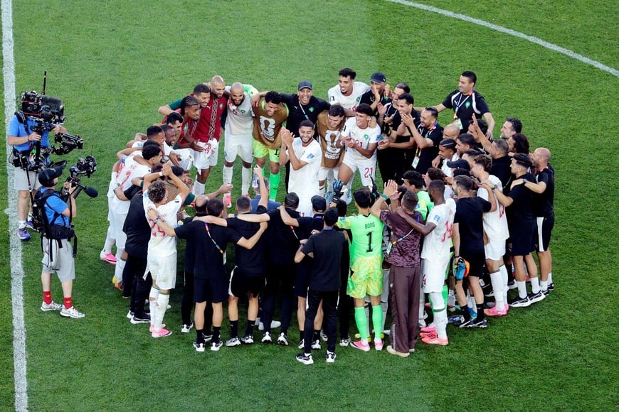 Soccer Football - FIFA World Cup 2026 - Group C - Scotland v Morocco - Boston Stadium, Foxborough, Massachusetts, U.S. - June 19, 2026
Morocco players celebrate in a huddle surrounding Morocco's Ismael Saibari at the end of the match REUTERS/Brian Snyder