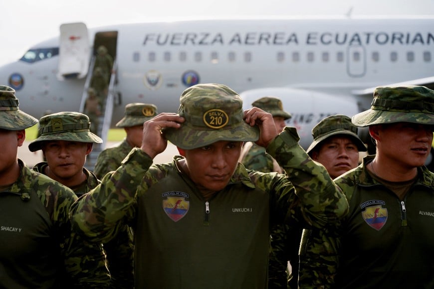 Ecuadorian troops stand guard at the Simon Bolivar Air Base before being deployed in the province of Guayas to strengthen security operations against criminal groups, in Guayaquil, Ecuador, June 18, 2026. REUTERS/Santiago Arcos