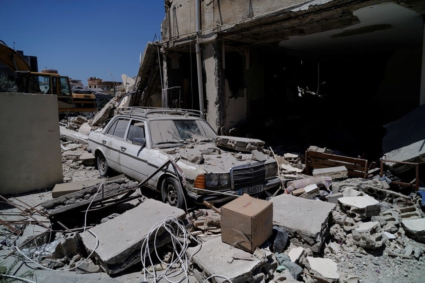 A damaged car at the site of an Israeli air strike on a house in Barish, in Tyre district, Lebanon June 20, 2026. REUTERS/Zohra Bensemra