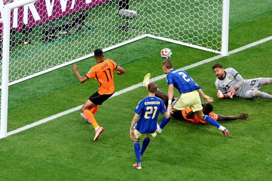 Soccer Football - FIFA World Cup 2026 - Group F - Netherlands v Sweden - Houston Stadium, Houston, Texas, U.S. - June 20, 2026
Netherlands' Cody Gakpo scores their third goal REUTERS/Pedro Nunes TPX IMAGES OF THE DAY