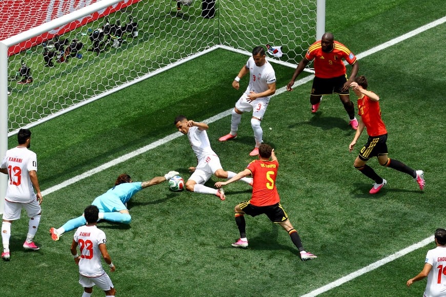 Soccer Football - FIFA World Cup 2026 - Group G - Belgium v Iran - Los Angeles Stadium, Inglewood, California, U.S. - June 21, 2026
Iran's Alireza Beiranvand in action with Belgium's Maxim De Cuyper, Iran's Ali Nemati and Belgium's Hans Vanaken as he makes a save REUTERS/Lisi Niesner TPX IMAGES OF THE DAY