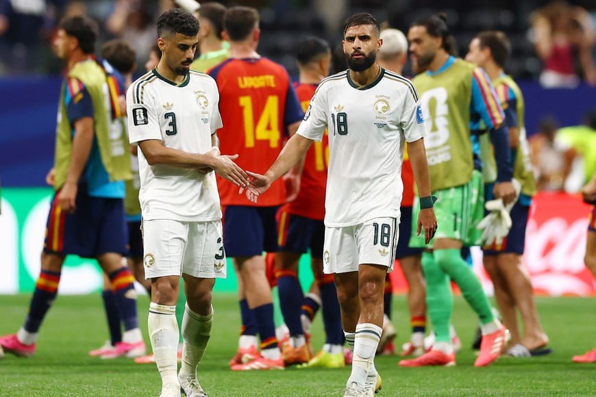 Soccer Football - FIFA World Cup 2026 - Group H - Spain v Saudi Arabia - Atlanta Stadium, Atlanta, Georgia, U.S. - June 21, 2026
Saudi Arabia's Ali Lajami and Alaa Al Hejji at the end of the match REUTERS/Claudia Greco