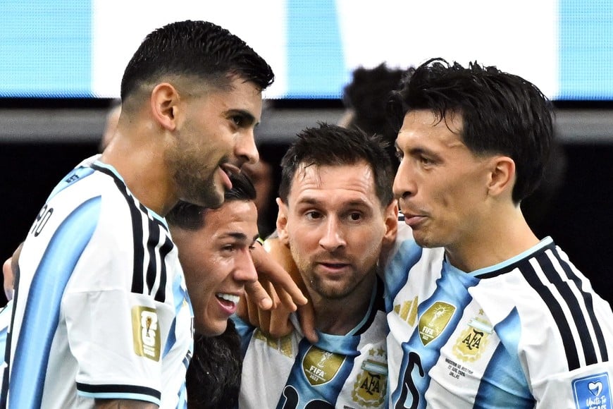 Soccer Football - FIFA World Cup 2026 - Group J - Argentina v Austria - Dallas Stadium, Arlington, Texas, U.S. - June 22, 2026
Argentina's Lionel Messi celebrates scoring their first goal with Cristian Romero, Lisandro Martinez and Enzo Fernandez IMAGN IMAGES via Reuters/Maria Lysaker