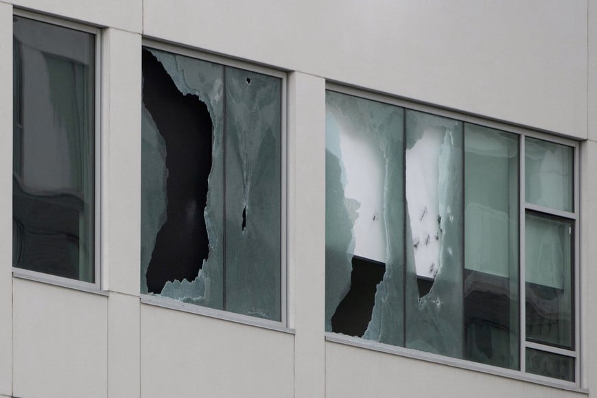 Broken glass on damaged windows, following a fatal shooting in which a police officer was killed in the Cote-des-Neiges neighbourhood, Montreal police say, in Montreal, Quebec, Canada, June 22, 2026. REUTERS/Peter McCabe TPX IMAGES OF THE DAY
