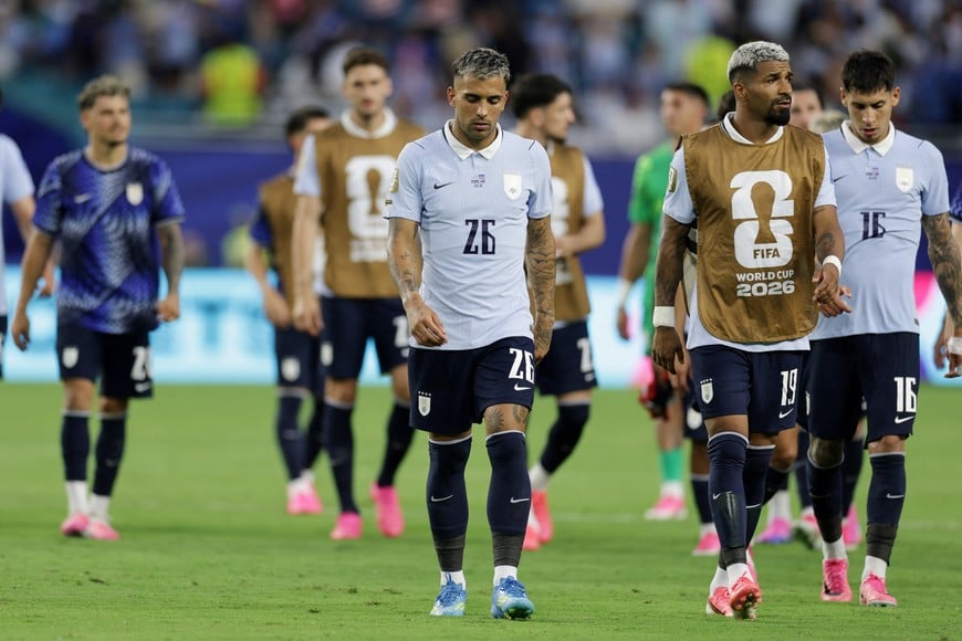 Soccer Football - FIFA World Cup 2026 - Group H - Uruguay v Cape Verde - Miami Stadium, Miami Gardens, Florida, U.S. - June 21, 2026
Uruguay's Rodrigo Zalazar, Rodrigo Aguirre and Mathias Olivera look dejected after the match REUTERS/Amanda Perobelli