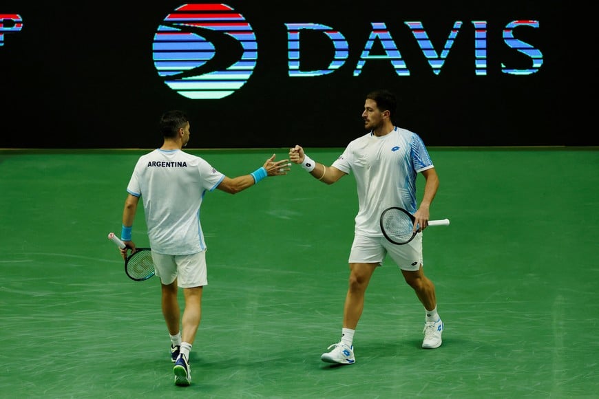Tennis - Davis Cup - Qualifiers - South Korea v Argentina - Gijang Gymnasium, Busan, South Korea - February 8, 2026
Argentina's Guido Andreozzi and Federico Agustin Gomez reacts during their match against South Korea's Jisung Nam and Uisung Park REUTERS/Kim Soo-Hyeon