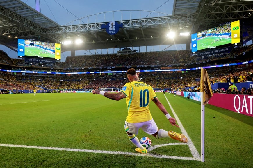 Soccer Football - FIFA World Cup 2026 - Group C - Scotland v Brazil - Miami Stadium, Miami Gardens, Florida, U.S. - June 24, 2026
Brazil's Neymar Jr. takes a corner kick IMAGN IMAGES via Reuters/Sam Navarro     TPX IMAGES OF THE DAY