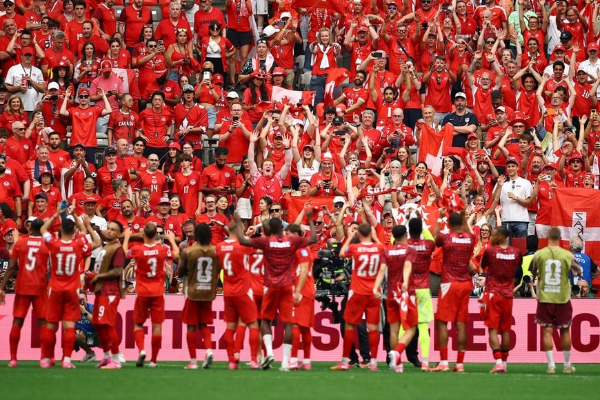Soccer Football - FIFA World Cup 2026 - Group B - Switzerland v Canada - BC Place, Vancouver, Canada - June 24, 2026
Switzerland fans celebrate with players after the match REUTERS/Agustin Marcarian