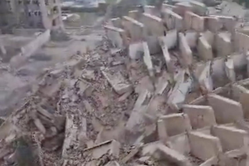 Destroyed buildings and debris cover the shoreline, in the aftermath of earthquakes, in La Guaira, Venezuela, June 24, 2026, in this screengrab taken from a social media video. SOCIAL MEDIA/via REUTERS  THIS IMAGE HAS BEEN SUPPLIED BY A THIRD PARTY. MANDATORY CREDIT. NO RESALES. NO ARCHIVES.

VERIFICATION:
- Reuters was able to confirm the location from the shape of the pool, buildings and shoreline which matched archive and satellite imagery of the area. 
- The date was verified from a statement from interim President Rodriguez who said dozens of buildings had collapsed in La Guaira. 
- Venezuelan authorities and USGS that two earthquakes struck Venezuela on June 24.