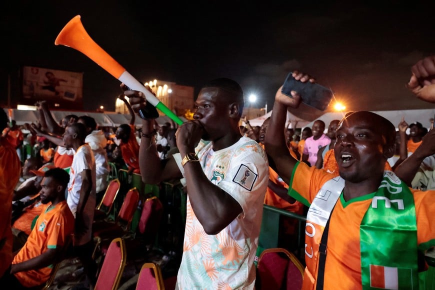 Soccer Football - FIFA World Cup 2026 - Group E - Curacao v Ivory Coast - Fans gather in Abidjan - Abidjan, Ivory Coast - June 25, 2026
Ivory Coast fans celebrate after the match as Ivory Coast qualify for the knockout stages of the World Cup REUTERS/Luc Gnago