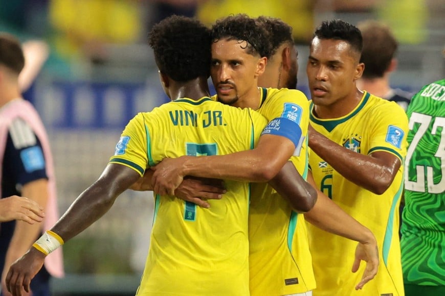 Soccer Football - FIFA World Cup 2026 - Group C - Scotland v Brazil - Miami Stadium, Miami Gardens, Florida, U.S. - June 24, 2026
Brazil's Marquinhos celebrates after the match with Vinicius Junior IMAGN IMAGES via Reuters/Sam Navarro