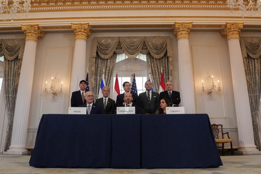 U.S. Secretary of State Marco Rubio talks alongside State Department Counselor Daniel Holler, Israel's Ambassador to the U.S. Yechiel Leiter and Lebanon's Ambassador to the U.S. Nada Hamadeh during an event to sign a framework agreement between Israel and Lebanon, at the State Department in Washington, D.C., U.S., June 26, 2026. REUTERS/Ken Cedeno