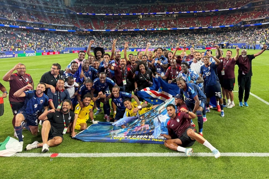Soccer Football - FIFA World Cup 2026 - Group H - Cape Verde v Saudi Arabia - Houston Stadium, Houston, Texas, U.S. - June 26, 2026
Cape Verde players and staff celebrate after the match as Cape Verde qualify for the knockout stages of the World Cup 
REUTERS/Pawel Kopczynski     TPX IMAGES OF THE DAY
