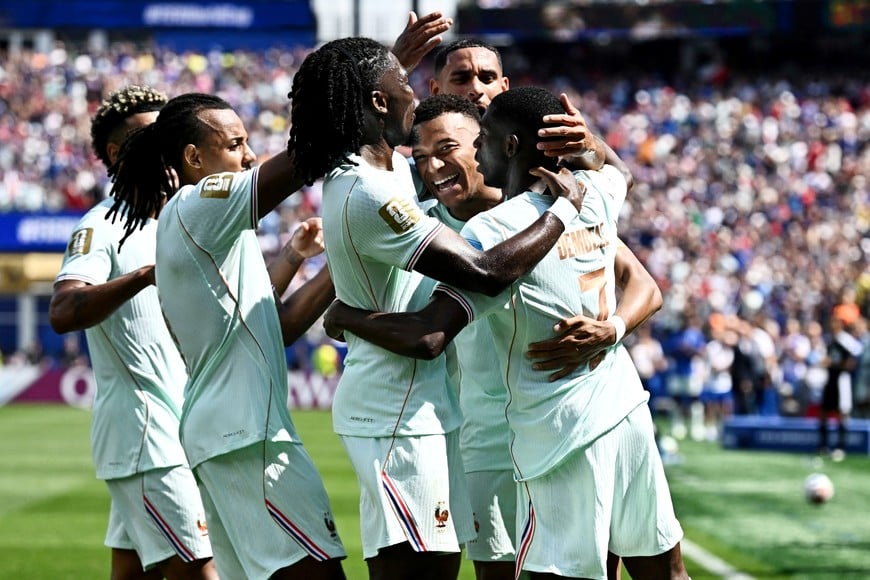 Soccer Football - FIFA World Cup 2026 - Group I - Norway v France - Boston Stadium, Foxborough, Massachusetts, U.S. - June 26, 2026
France's Ousmane Dembele celebrates scoring their third goal with teammates, completing his hat-trick REUTERS/Dylan Martinez     TPX IMAGES OF THE DAY