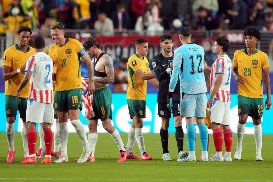 Soccer Football - FIFA World Cup 2026 - Group D - Paraguay v Australia - San Francisco Bay Area Stadium, Santa Clara, California, U.S. - June 25, 2026
Australia and Paraguay players shake hands after the match IMAGN IMAGES via Reuters/Darren Yamashita