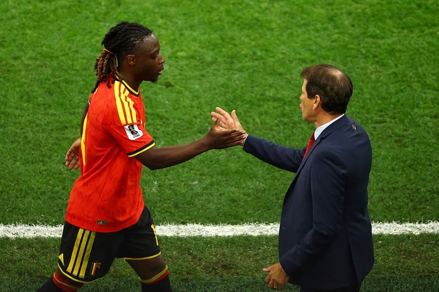Soccer Football - FIFA World Cup 2026 - Group G - New Zealand v Belgium - BC Place, Vancouver, Canada - June 26, 2026
Belgium's Jeremy Doku shakes hands with coach Rudi Garcia as he is substituted REUTERS/Agustin Marcarian
